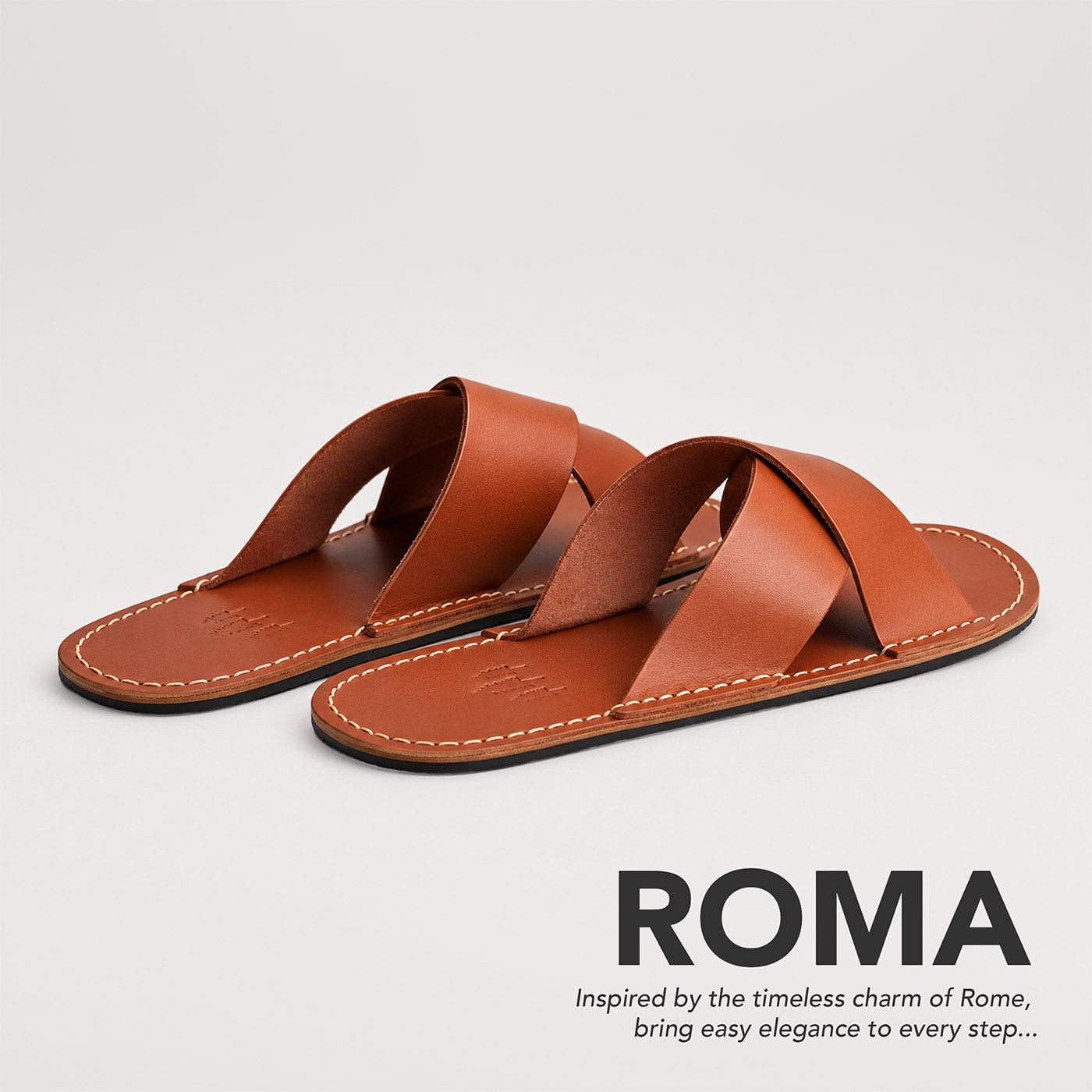 Miele | Flat leather sandals with debossed PLG three tree logo in sole, text reads "Roma. Inspired by the timeless charm of Rome, bring easy elegance to every step..."