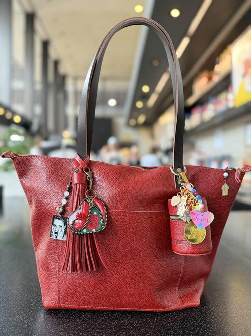I love the Rollie Pouch! I want one in every color! So handy! It holds my key fob - customer review photo