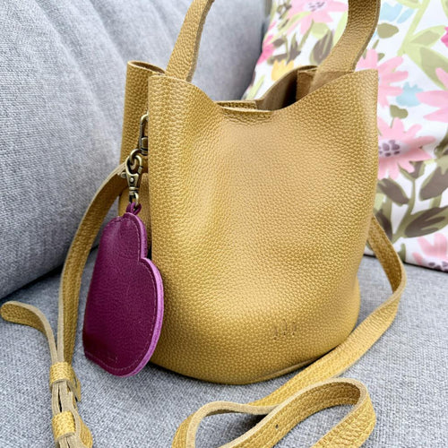 The small Belle Bucket Bag in sunshine is everything I didn’t know I needed! - customer review photo