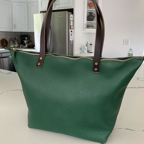 Gorgeous tote! The color is amazing! Many compliments in the brief time I’ve owned it - customer review photo