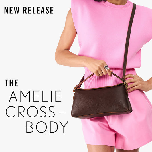 A model wearing a Coldbrew Amelie Crossbody bag. The image includes text overlays reading 'NEW RELEASE' and 'THE AMELIE CROSS BODY'.