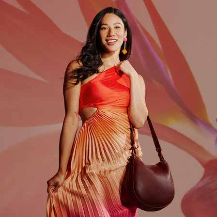 Nutmeg*Medium | Rounded shoulder bag with adjustable strap on a white background