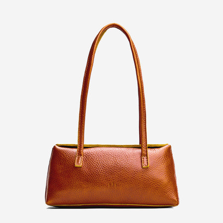 Sienna | Leather bowler bag with magnetic closure