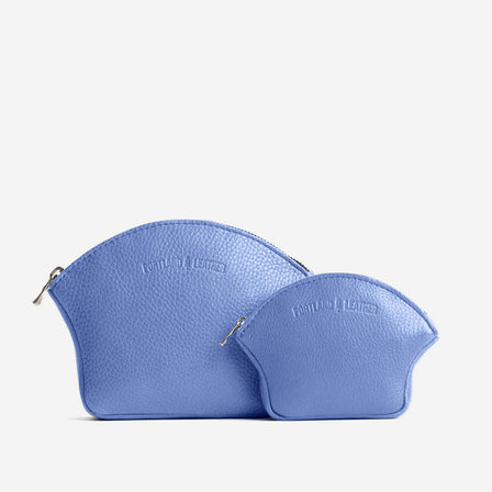 Aster*Small | Seashell shaped leather makeup bag with curved top zipper and flat bottom