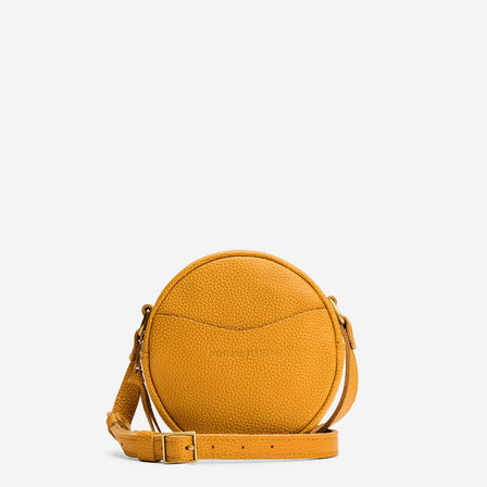 Sunshine | Circle shaped crossbody bag with top zipper and gold accents