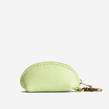 Shadow Lime | Taco shaped leather pouch with zipper and swivel lobster clasp on white background