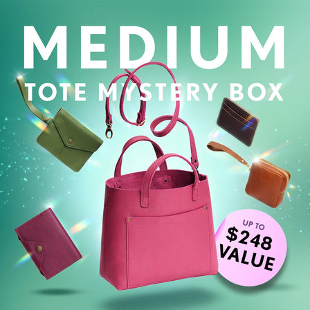 Promotional graphic for a 'Medium Tote Mystery Box' featuring a collection of totes, wallets, and small goods. Set against a sparkly background with a pink badge indicating up to $248 value.