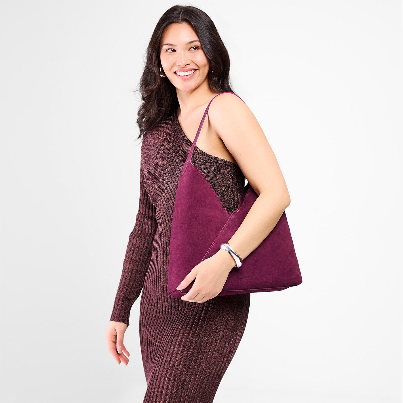 Superbloom*Oversized | Model wearing large shoulder bag with magnetic snap closure