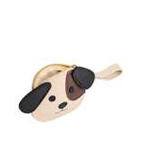Oatmilk | A small dog-shaped leather pouch with embroidered facial details and a wrist strap.