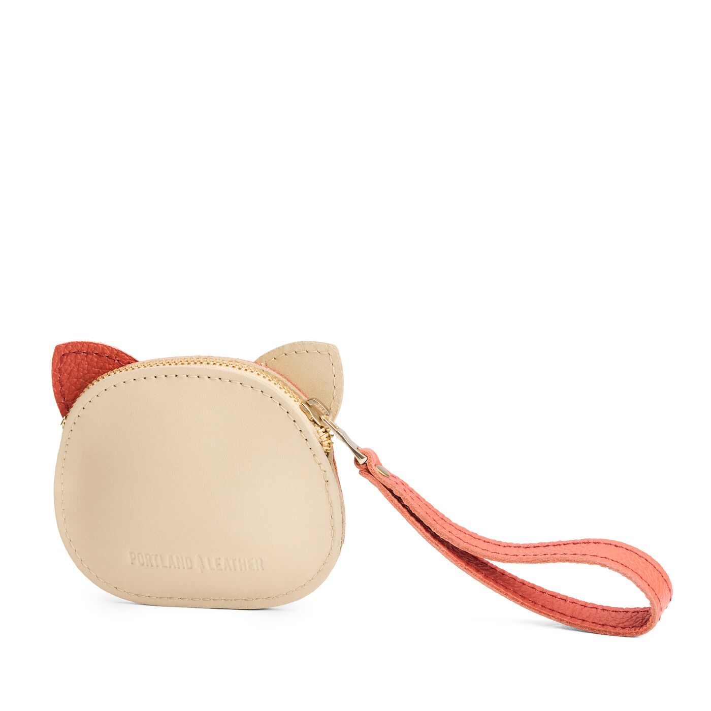 Bone | A small cat-shaped leather pouch with embroidered facial details and a wrist strap.