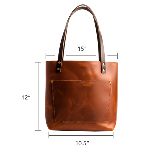 Tan / Cognac Leather tote bag with large outside pocket. The
