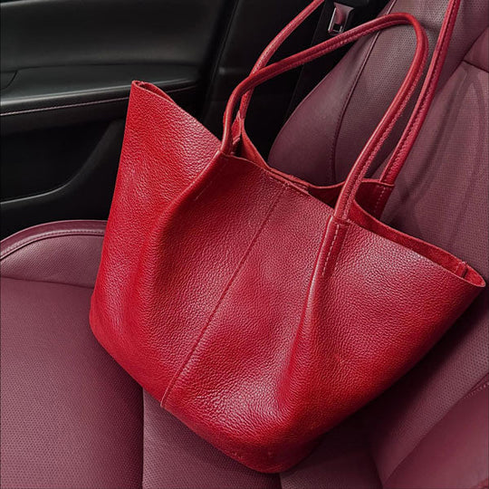 Chili Red Devan Bucket Bag in car seat