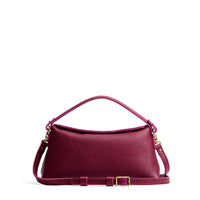 Orchid | Leather bowler bag with magnetic closure against a white background