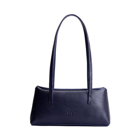 Cobalt | Leather bowler bag with magnetic closure against a white background