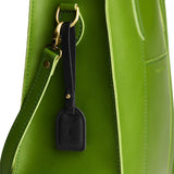 Black | Simple oval tab tassel with Sam Browne closure on a bag