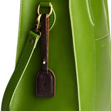 Coldbrew | Simple oval tab tassel with Sam Browne closure on a bag