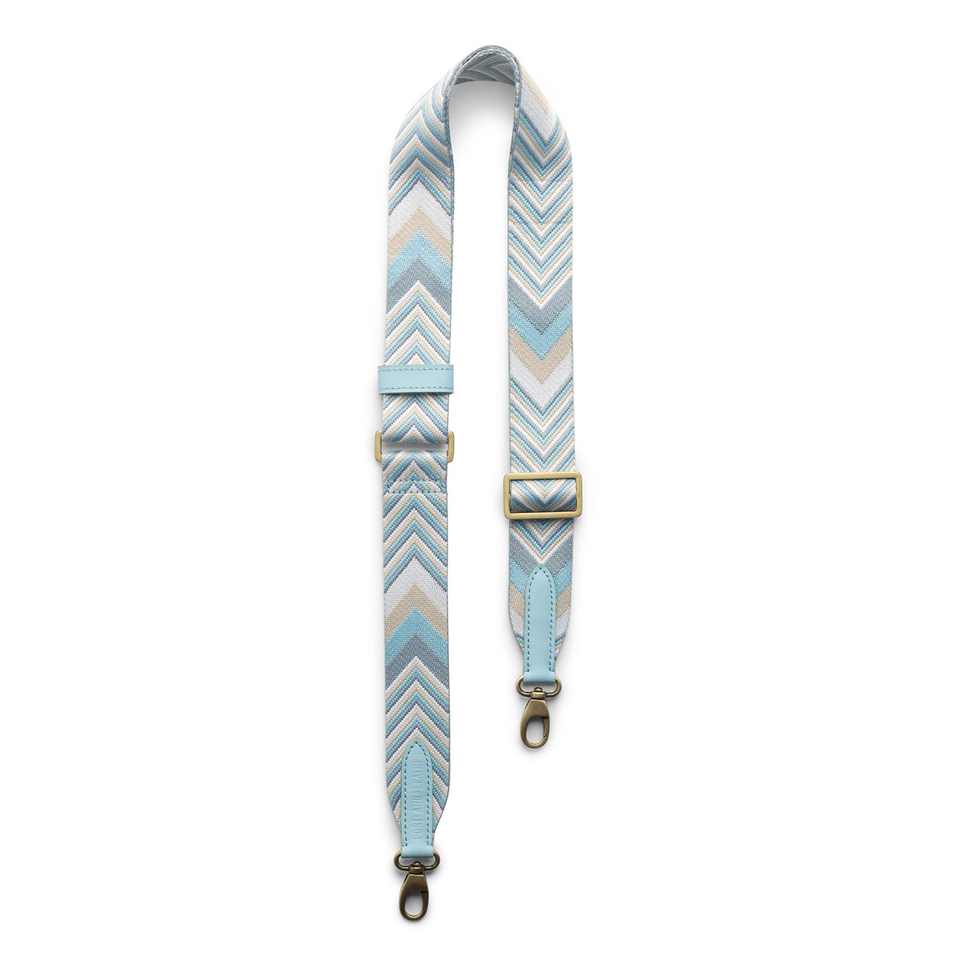 Iceberg | Strap with chevron pattern and brass-toned hardware