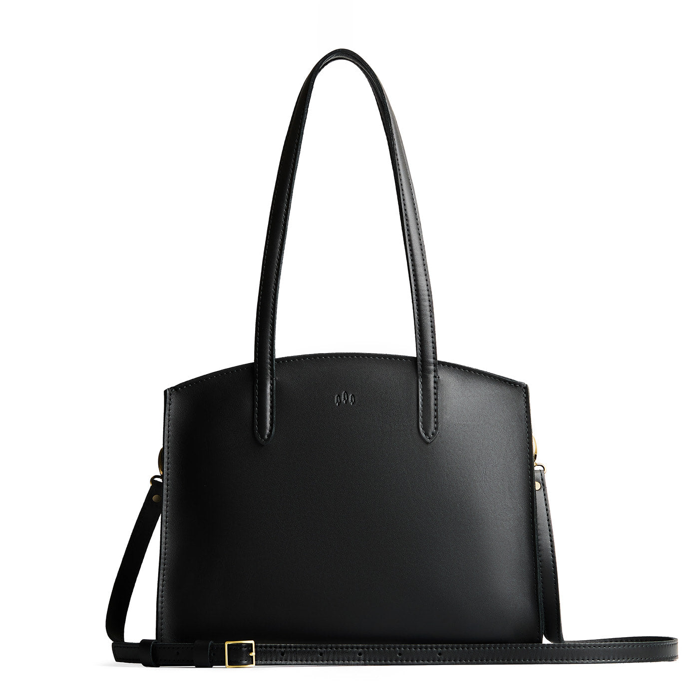 Black*Large | Leather tote bag with handles, adjustable crossbody strap, zipper top, and two back pockets