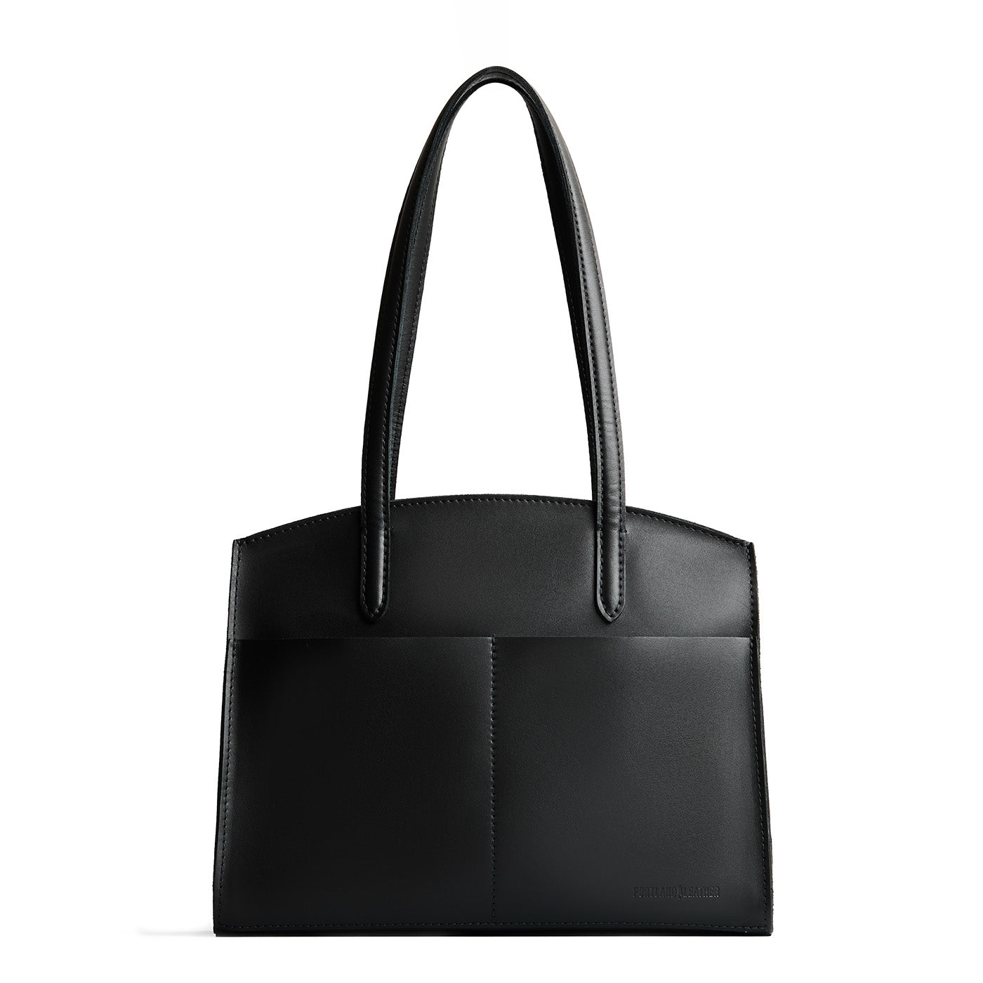Black*Large | Leather tote bag with handles, adjustable crossbody strap, zipper top, and two back pockets