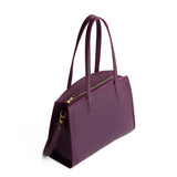 Plum Large | Leather tote bag with handles, adjustable crossbody strap, zipper top, and two back pockets