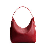 Chili Red Large | U-shaped, flat-bottomed leather shoulder bag with adjustable strap