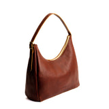 Nutmeg Large | U-shaped, flat-bottomed leather shoulder bag with adjustable strap