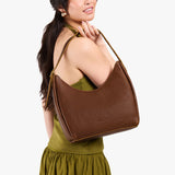 Asheville Medium | U-shaped, flat-bottomed leather shoulder bag with adjustable strap