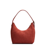 Cinnabar Medium | U-shaped, flat-bottomed leather shoulder bag with adjustable strap