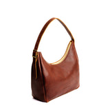 Nutmeg Medium | U-shaped, flat-bottomed leather shoulder bag with adjustable strap
