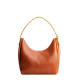 Sienna Medium | U-shaped, flat-bottomed leather shoulder bag with adjustable strap