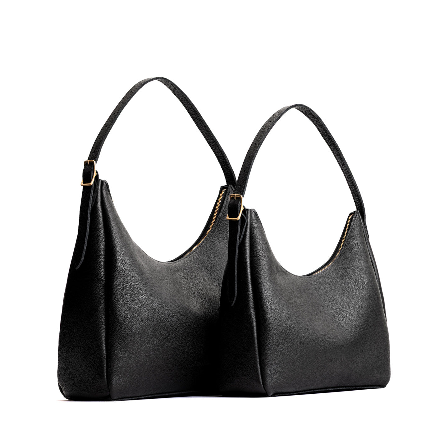 Pebbled--black | Size comparison image of large and medium u-shaped, flat-bottomed leather shoulder bags with adjustable strap