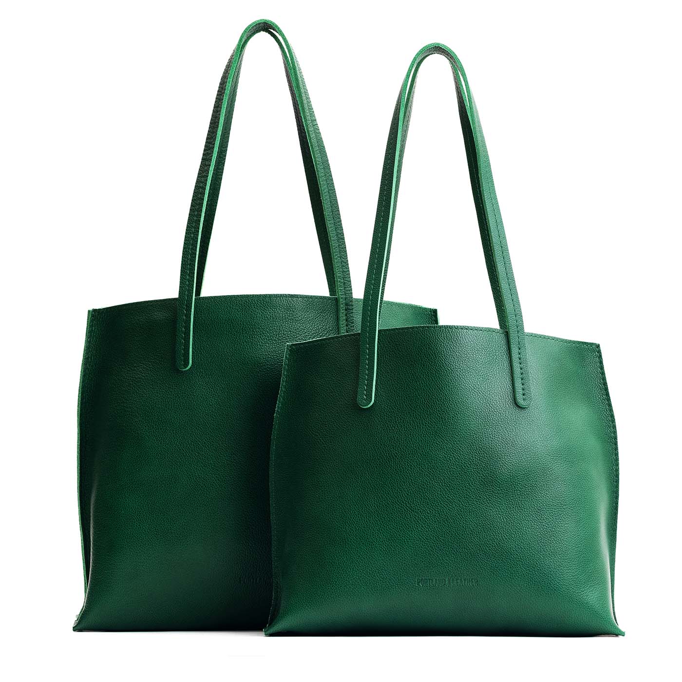Bacalar | Side by side comparison of both sizes of leather totes