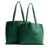 Bacalar | Side by side comparison of both sizes of leather totes
