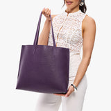 Empire Large| Model holding leather tote bag with matching leather handles
