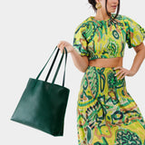 Forest Green Large | Model holding leather tote bag with interior snap key loop