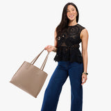 Stone Large | Model carrying leather tote bag with matching leather handles