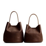 Coldbrew | Size comparison image of two symmetrical leather bucket bags