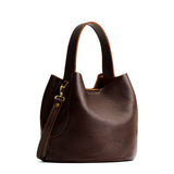 Coldbrew Small | Symmetrical bucket bag with handle, latch closure, and removable crossbody strap