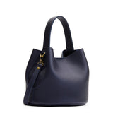 Night Owl Small | Symmetrical bucket bag with handle, latch closure, and removable crossbody strap