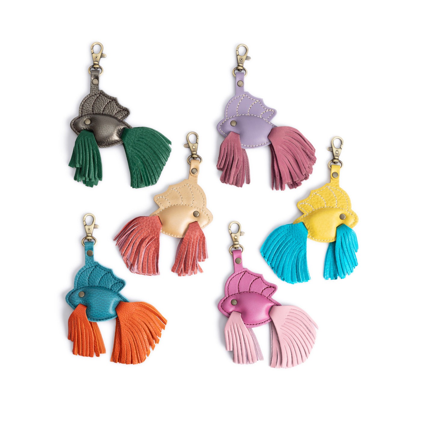 All Variants | Group shot of leather betta fish shaped keychains with tassel fins and metal lobster clasp