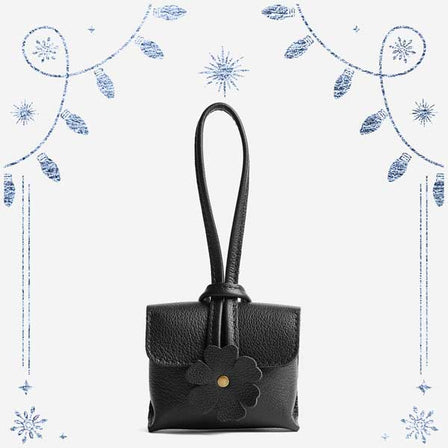 Pebbled--black | Wristlet pouch with loop strap and a flower design