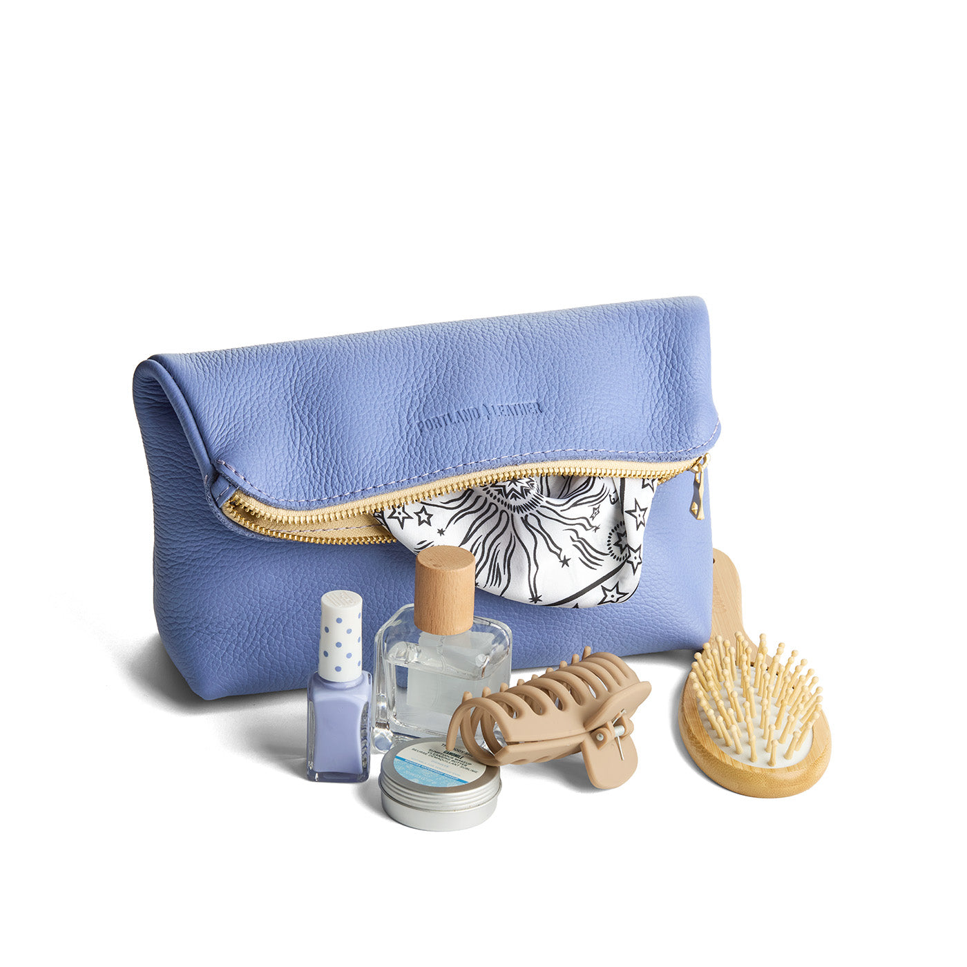 Aster | Closed folded zipper pouch with items