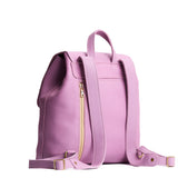 Calla Lily | Back of leather backpack showing rear zippered pocket on a white background