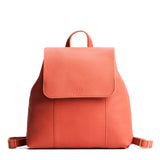 Coral | Leather backpack with magnetic flap closure on a white 