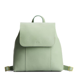 Pistachio | Leather backpack with magnetic flap closure on a white 