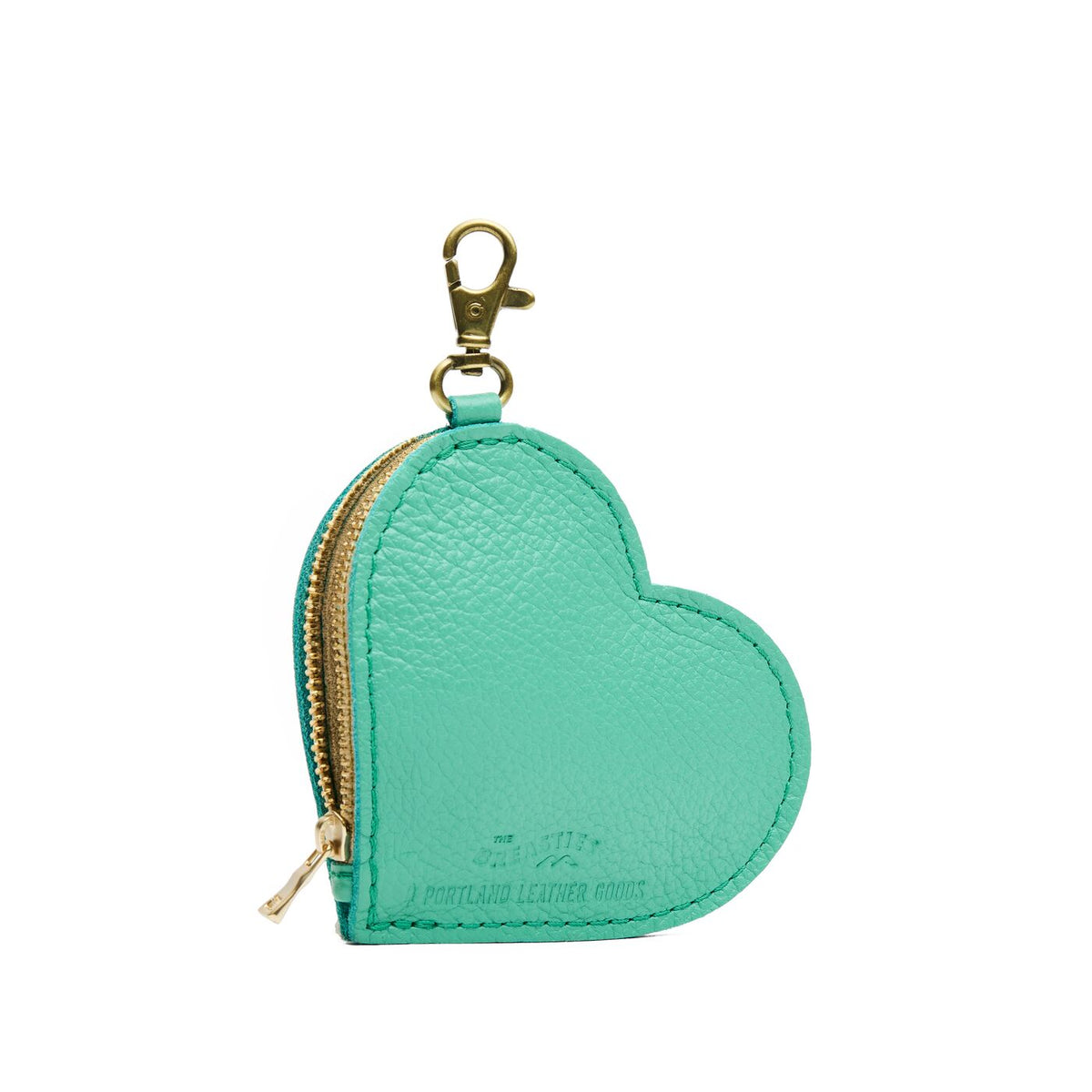 Spruce | Heart-shaped pouch with a gold clasp on a white background