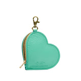 Spruce | Heart-shaped pouch with a gold clasp on a white background