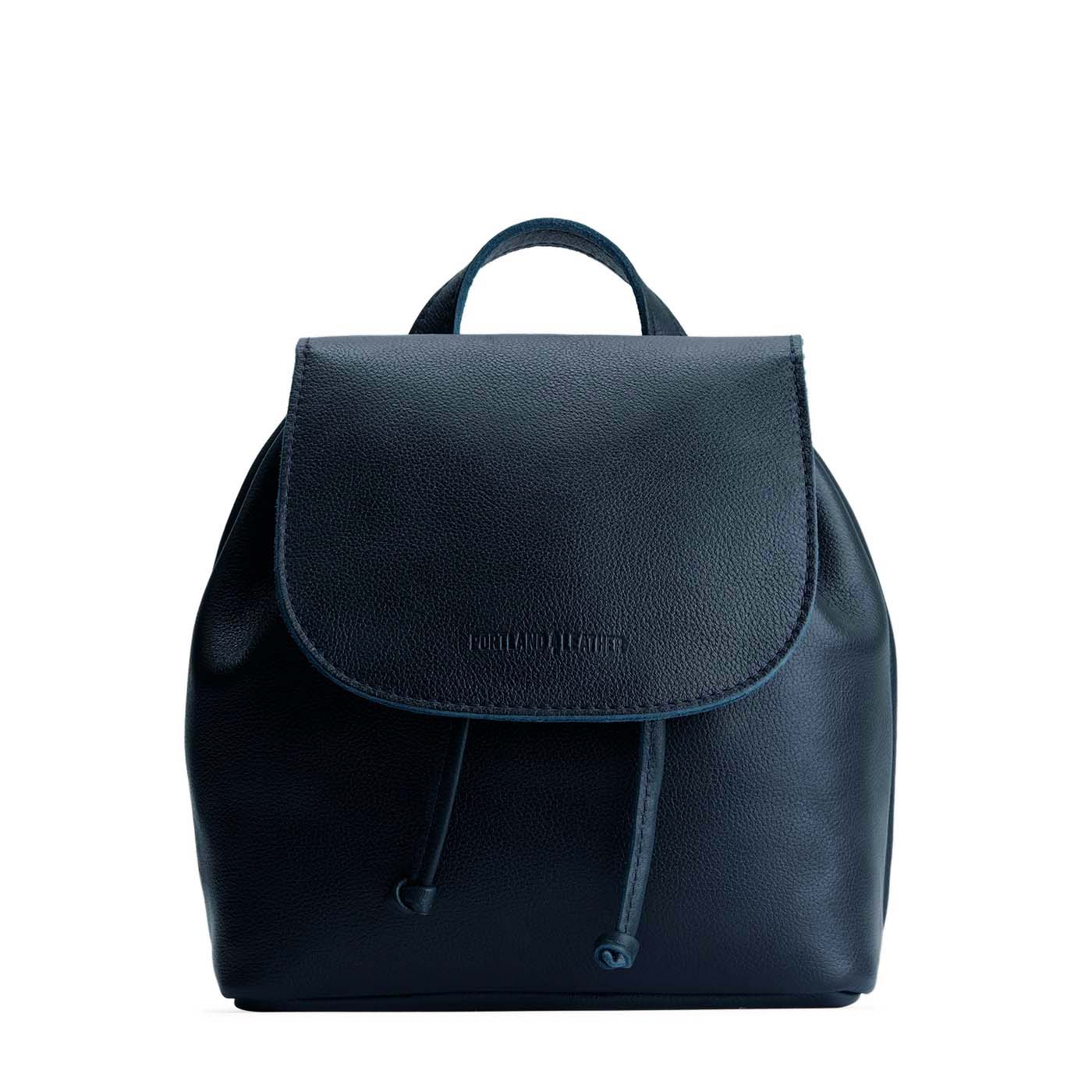 Boreal | Drawstring bucket backpack with snap closure under flap