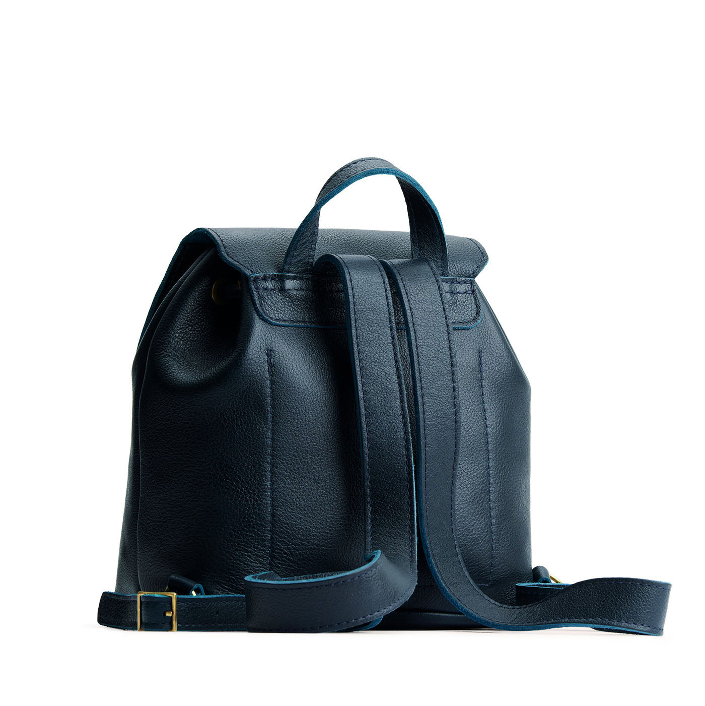 Boreal | Back of drawstring bucket backpack with snap closure under flap