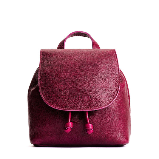 Orchid | Drawstring bucket backpack with snap closure under flap